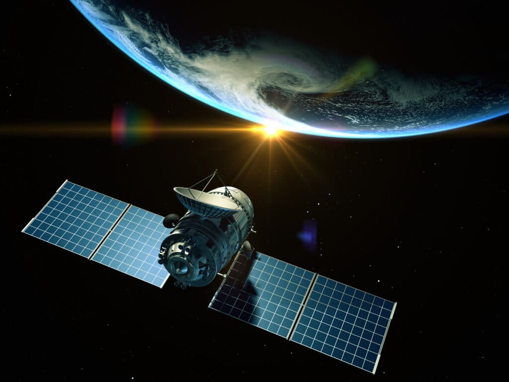 Satellite in space approaching a planet